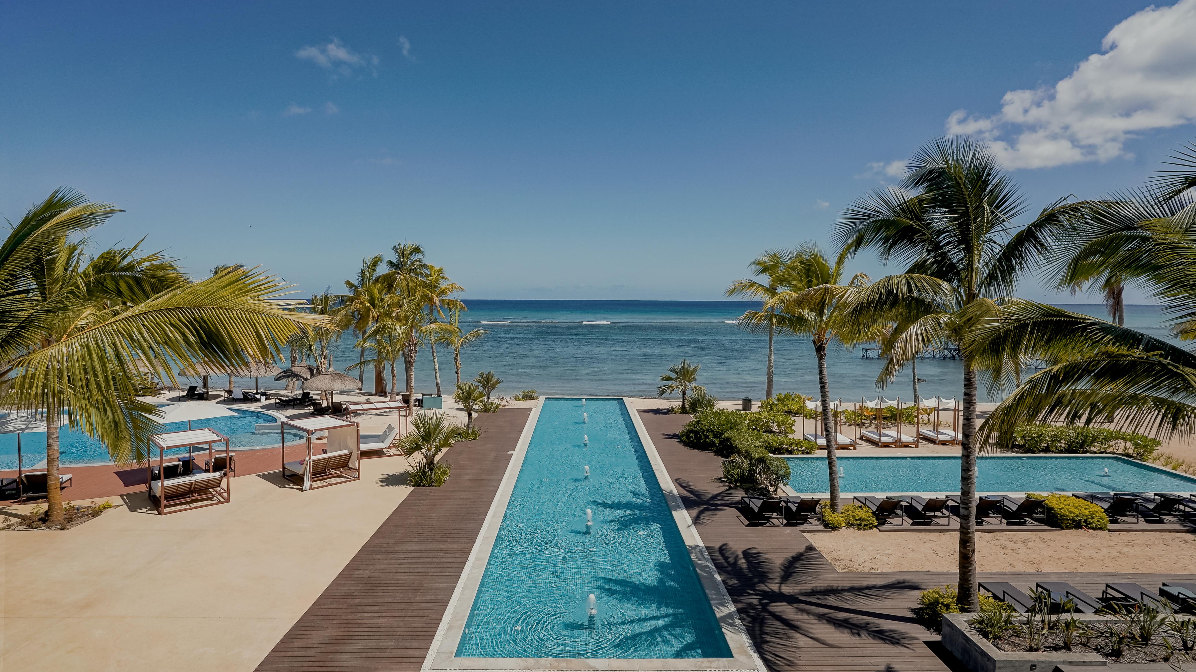 فندق لو ميريديان إلموريس بوينتي أو بيتشيز المظهر الخارجي الصورة The swimming pool at the resort