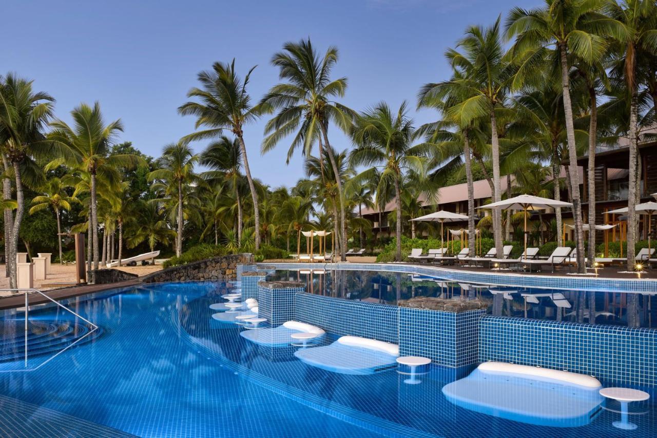 فندق لو ميريديان إلموريس بوينتي أو بيتشيز المظهر الخارجي الصورة The swimming pool at the resort
